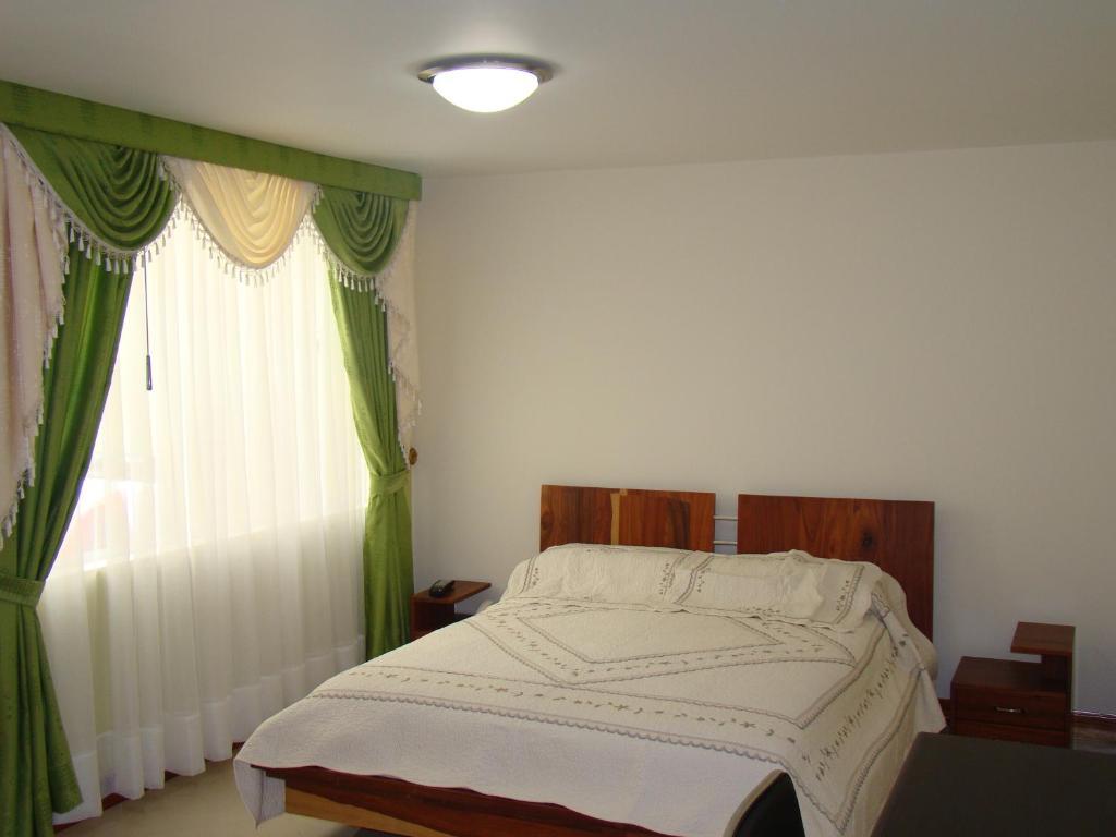 Apartahotel Vincent Suites Pasto Room photo